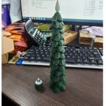 Festive Candle Featuring Pine Cone Motif