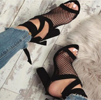 Women lace up high heel sandals